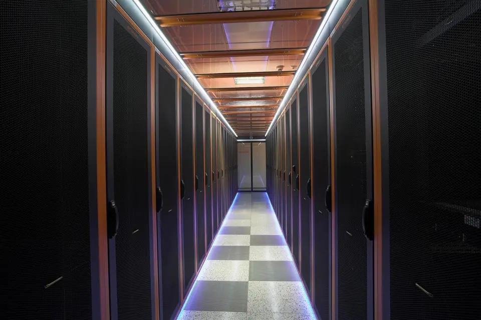 Illuminated aisle between two rack rows