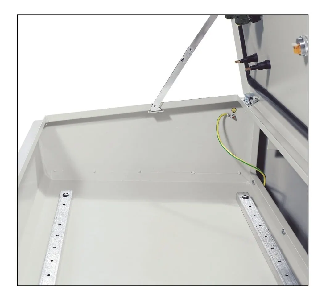 ZPAS PSL control desk interior view with perforated mounting rails in the open upper section